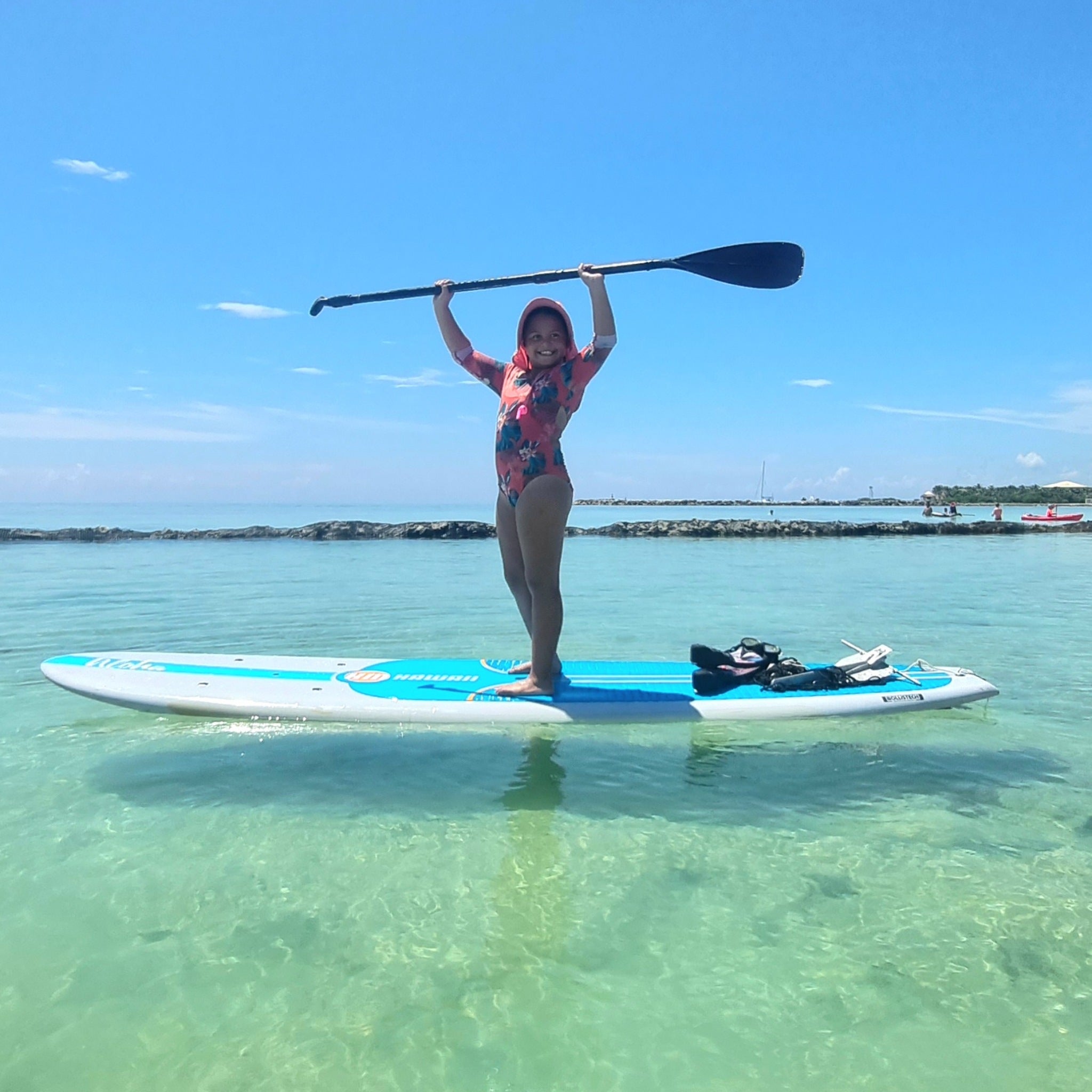 Paddle Boarding Fun - Beyond the Experience® - On - Board service